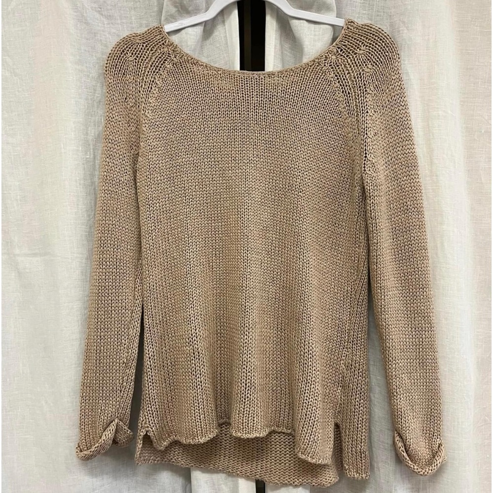 Beige sweater, slightly off the shoulders